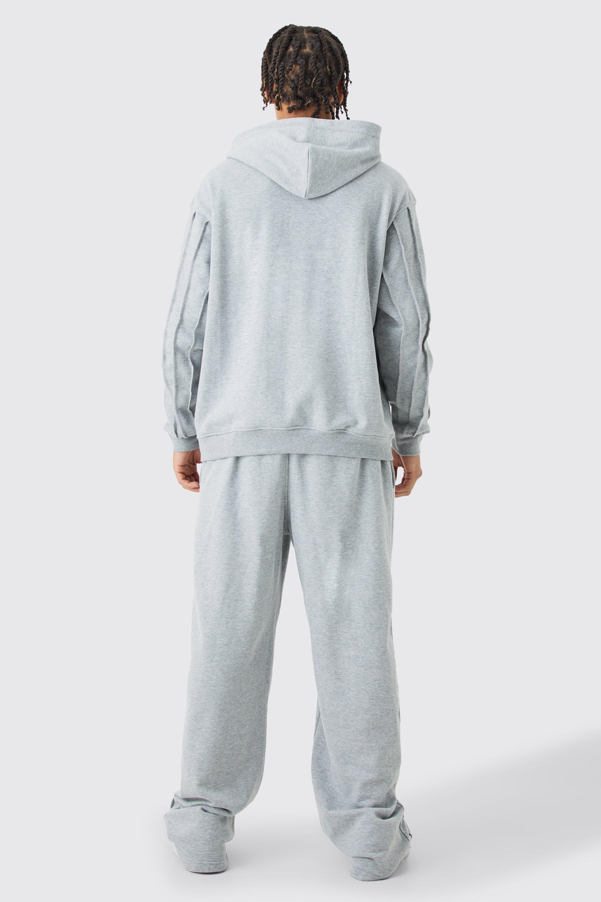 Oversize Trainingsanzug mit rohem Saum, Man Signature Stickerei und Kapuze