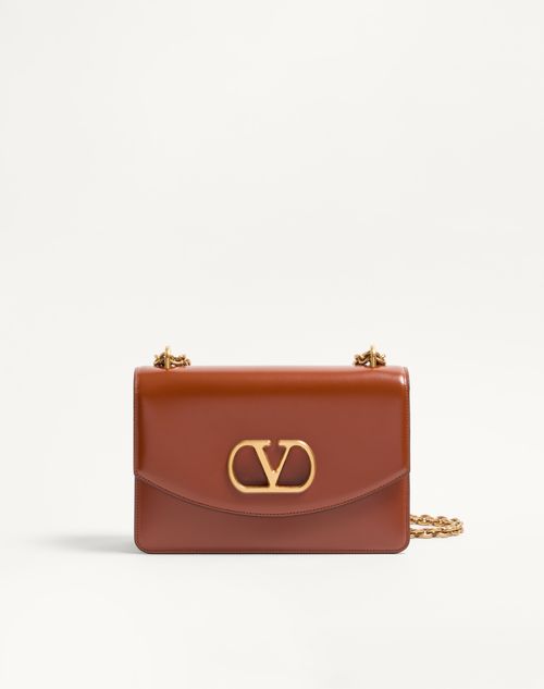 Bolsa de ombro Valentino Garavani Vain em couro de bezerro brilhante
