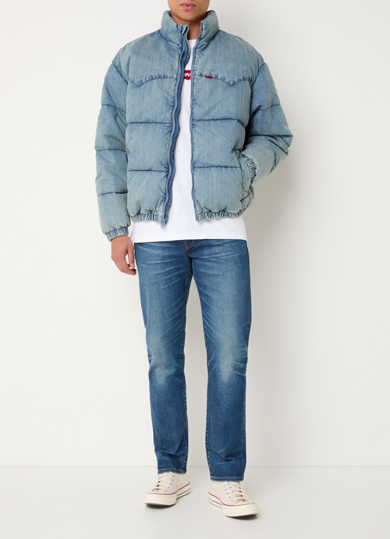 Jachetă din denim matlasată Levi's cu umplutură din puf și buzunare cu fermoar.