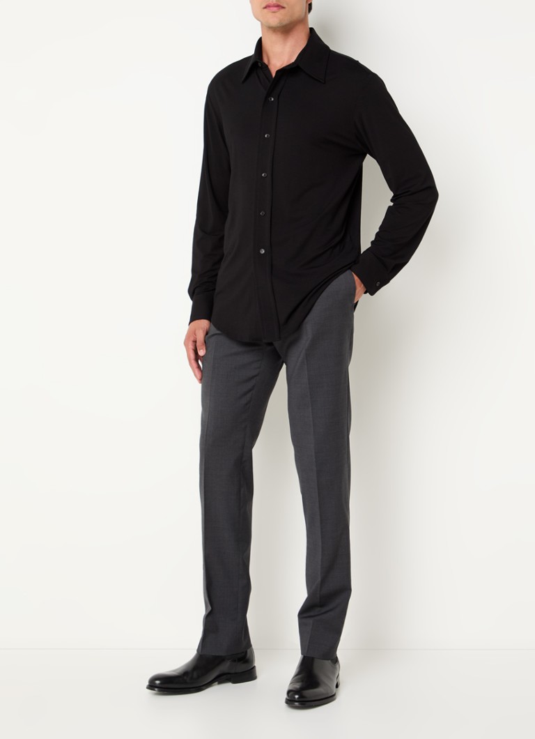 Pantaloni Sandro slim fit din lână virgină, cu buzunare laterale.