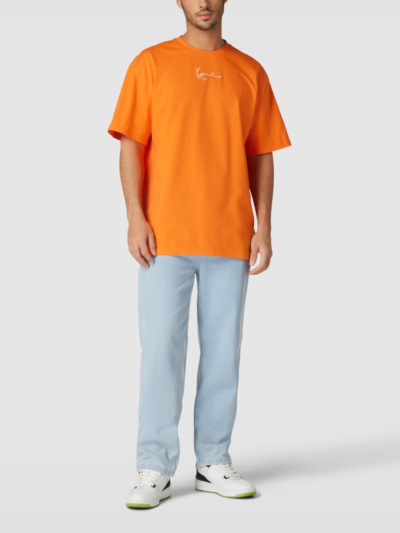 Oversized T-Shirt mit Label-Stitching - P&C X Karl Kani in dunkel orange