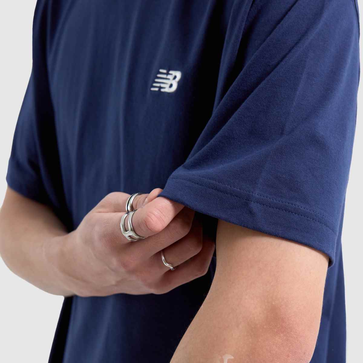 New Balance – Marinblå sport-t-shirt i bomull
