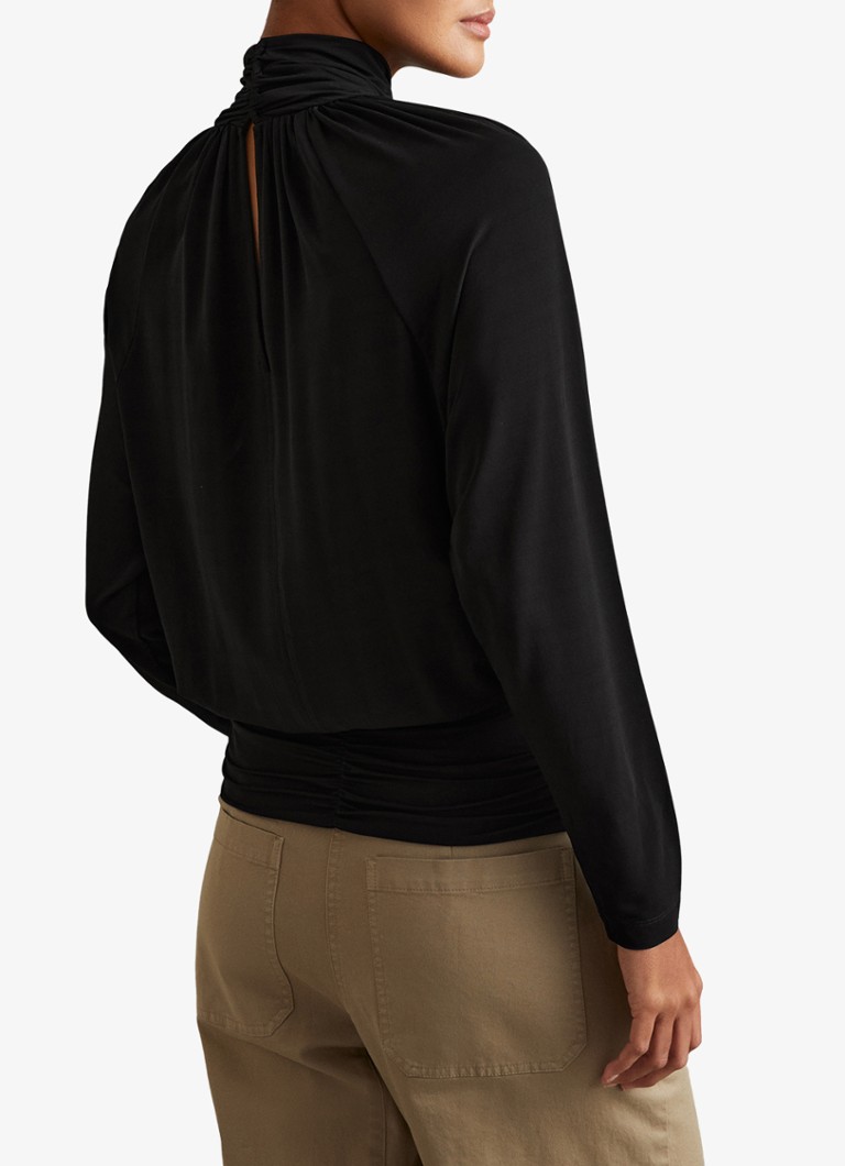 Top Reiss Adrienne con collo alto e dettagli traforati.
