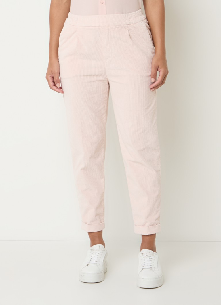 Pantaloni mulați din catifea reiată, cu talie înaltă și croială scurtă pe picior, de la Benetton.