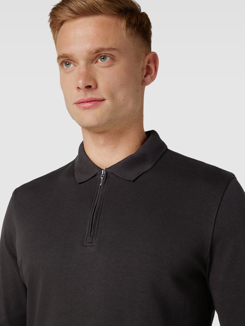 Poloshirt mit kurzerm Reißverschluss in schwarz