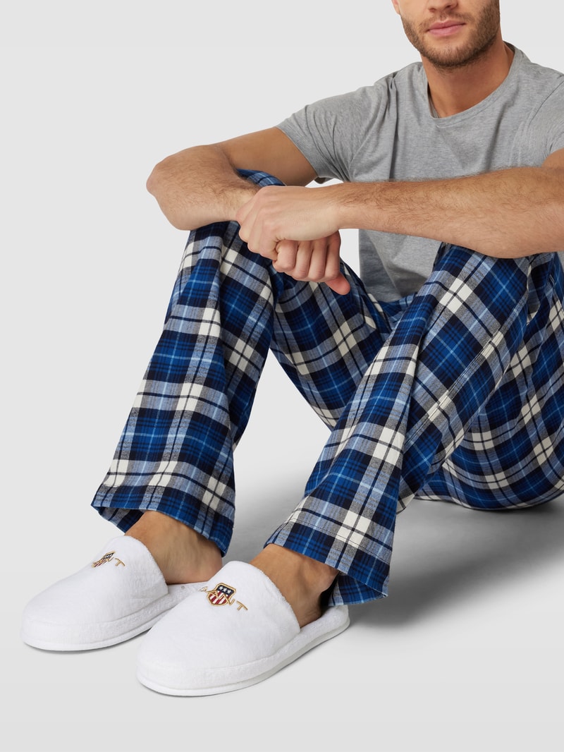 Hausschuhe mit Label-Stitching in weiß