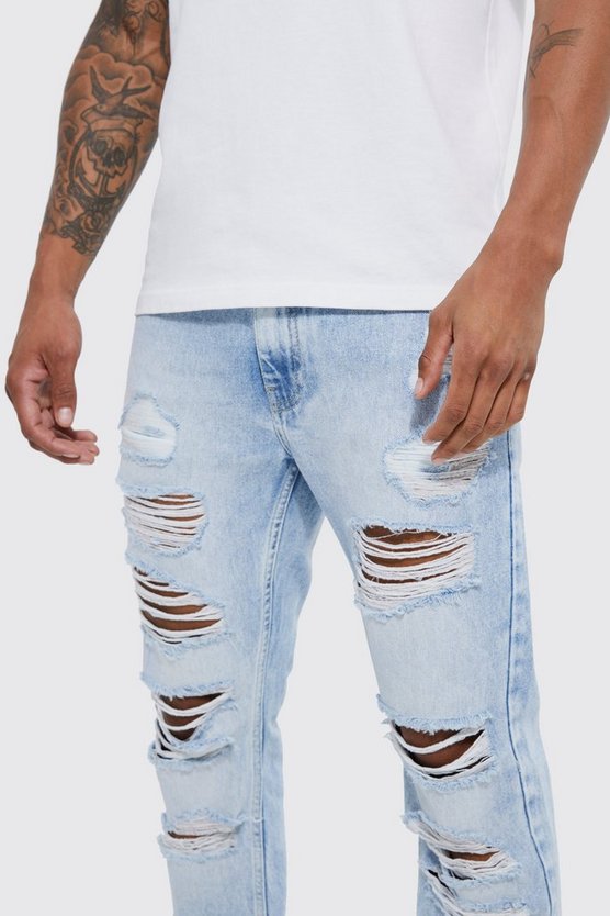 Slim-Fit Schlagjeans mit Rissen