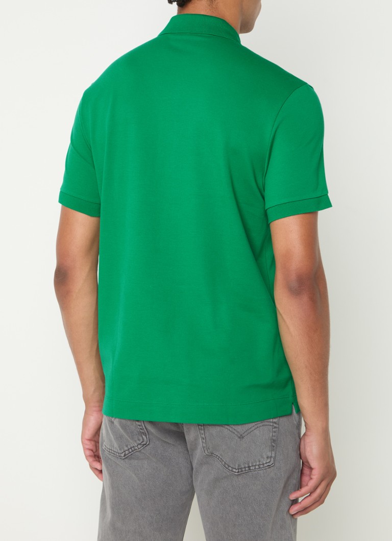 Tricou polo Lacoste cu croială clasică și logo brodat.