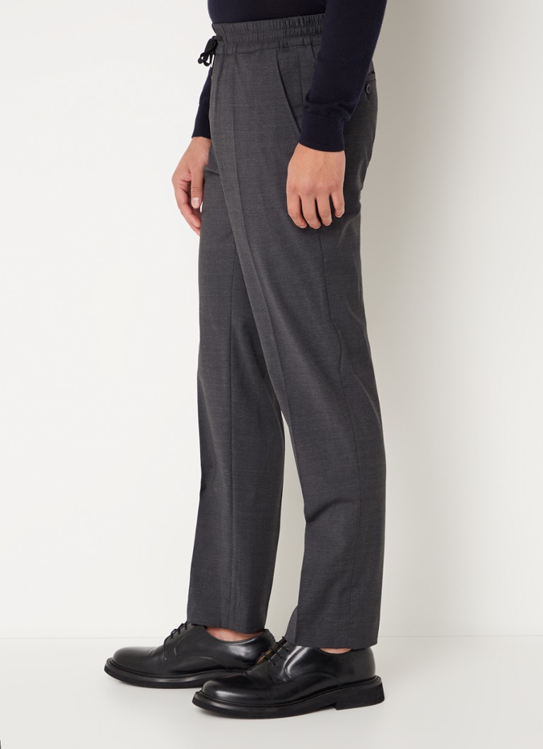 Pantaloni chino Sandro din amestec de lână, cu croială mulată și buzunare laterale.