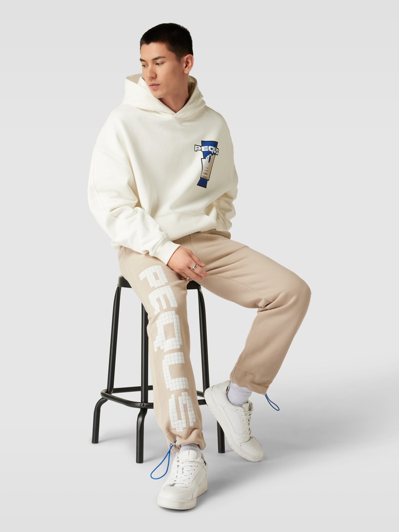 PEQUS X P&C - Sweatpants mit Label-Details in beige