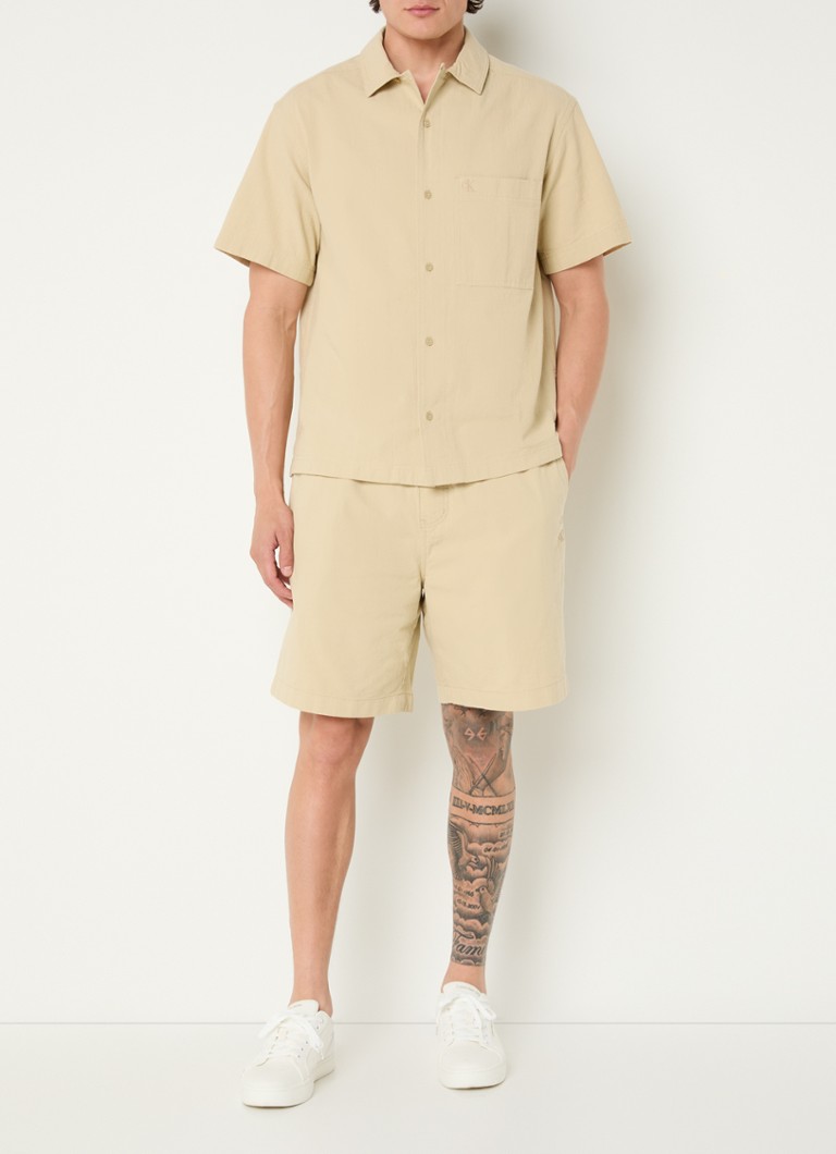 Pantaloni scurți largi Calvin Klein cu buzunare laterale