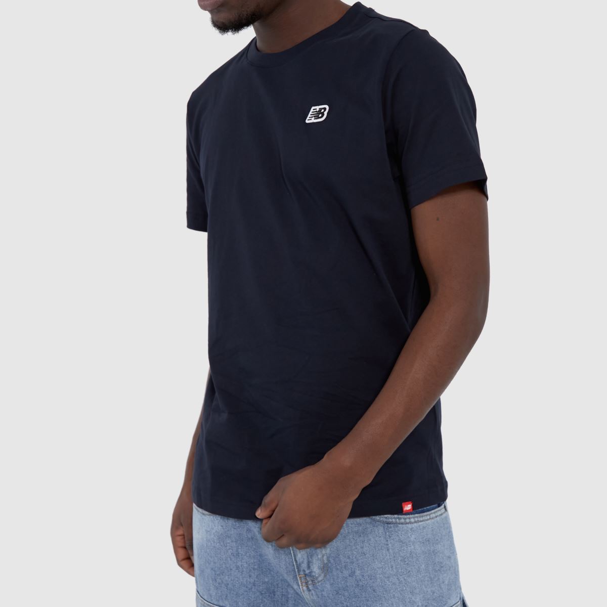 New Balance – Marinblå t-shirt med liten logga