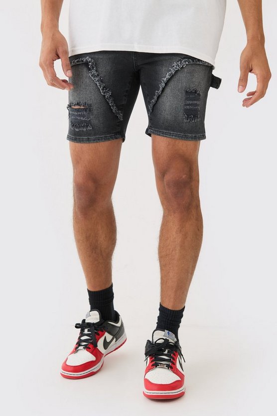 Schwarze Skinny Stretch Jeansshorts mit Rissen
