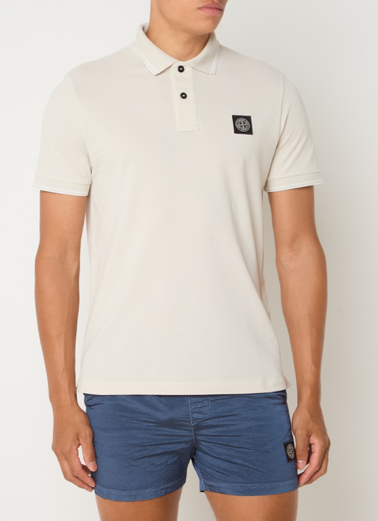 Polo Stone Island 2SC18 de corte regular, confeccionada em algodão piqué com punhos texturizados.