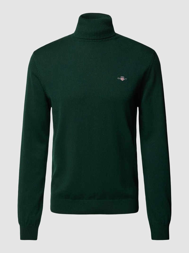 Rollkragenpullover mit Label-Stitching aus Baumwoll-Woll-Mix in dunkelgrün