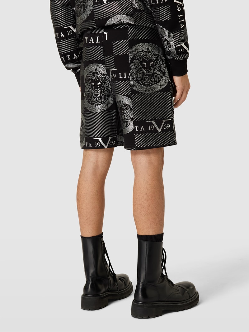 Sweatshorts mit Allover-Muster in schwarz