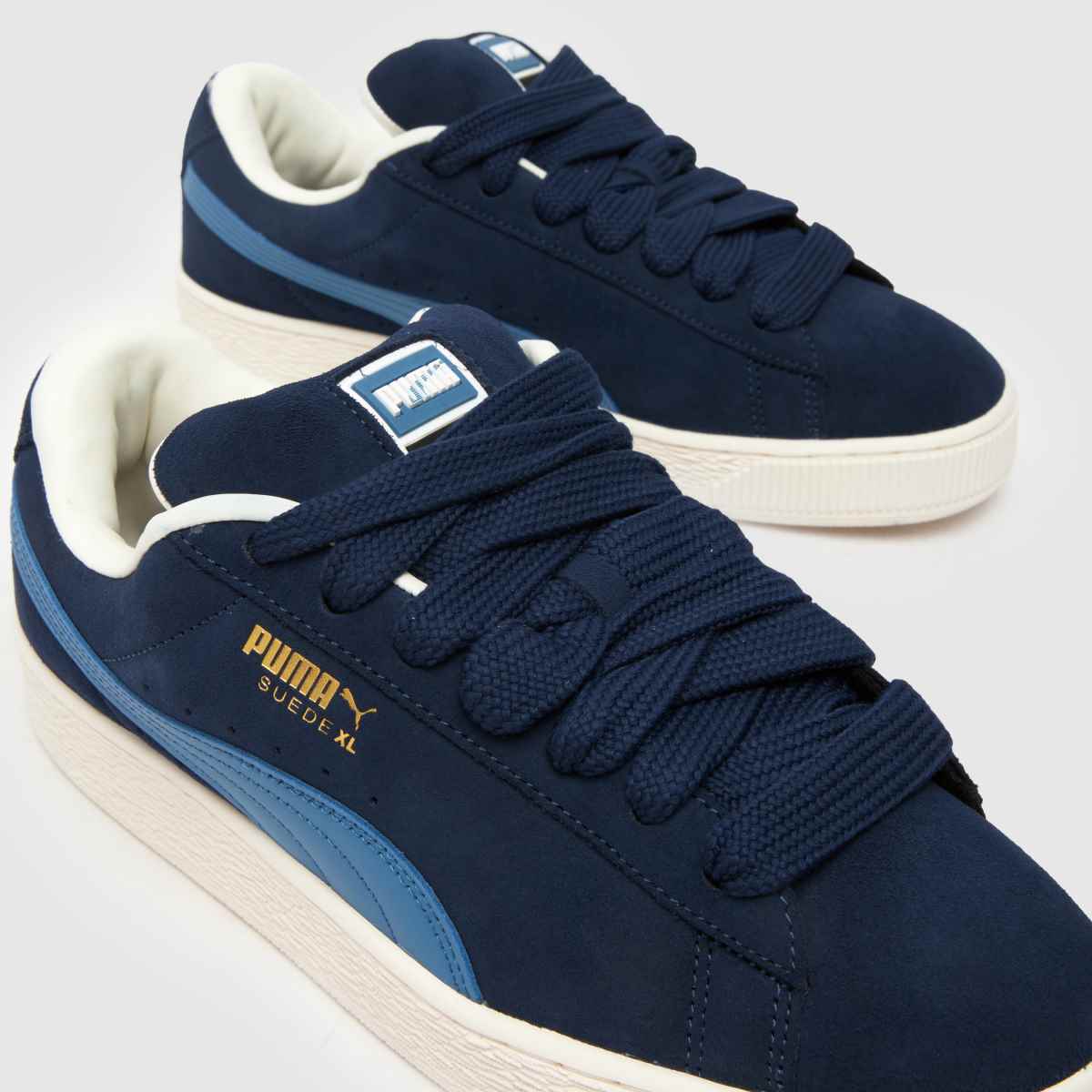 PUMA – Marinblå XL-sneakers i mocka