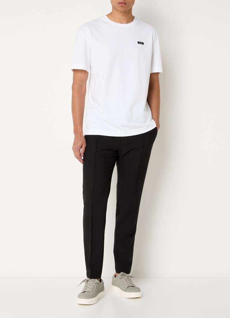 Calvin Klein slim fit trousers with pressed crease and drawstring