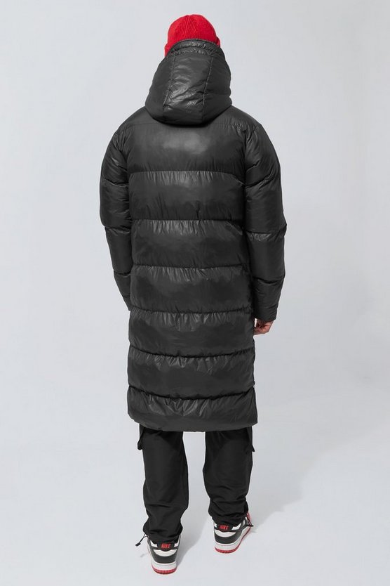 Lange Steppjacke mit Saum-Detail