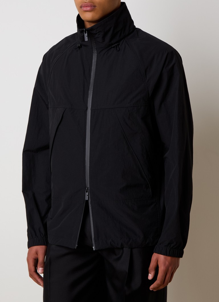 Burberry jacket with stowable hood and logo embroidery