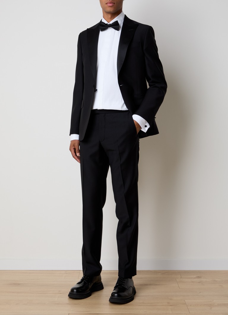 Pantaloni eleganți din lână Denz de la Oscar Jacobson, cu o croială rafinată și opțiune de călcare.