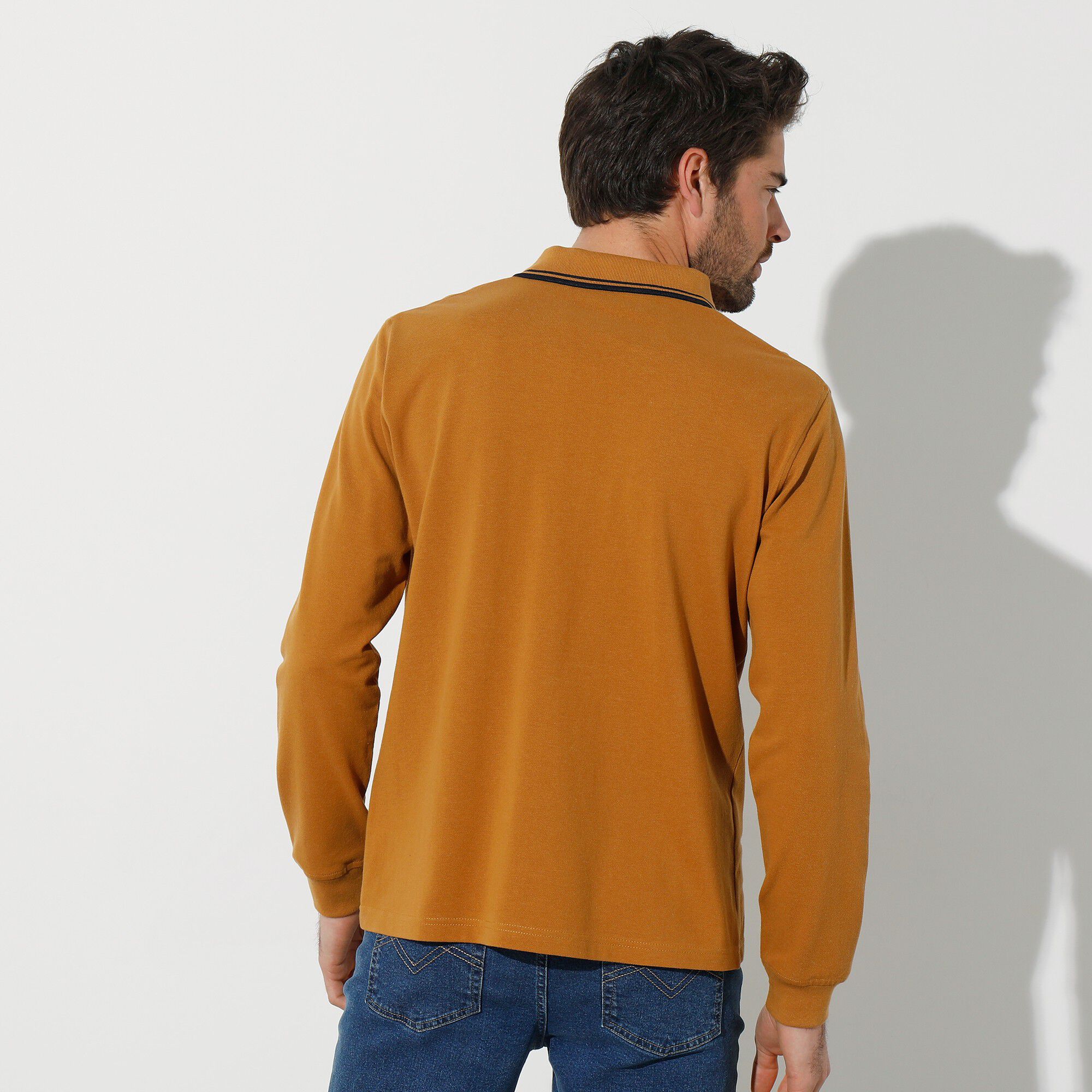 Polo uni maille piquée manches longues