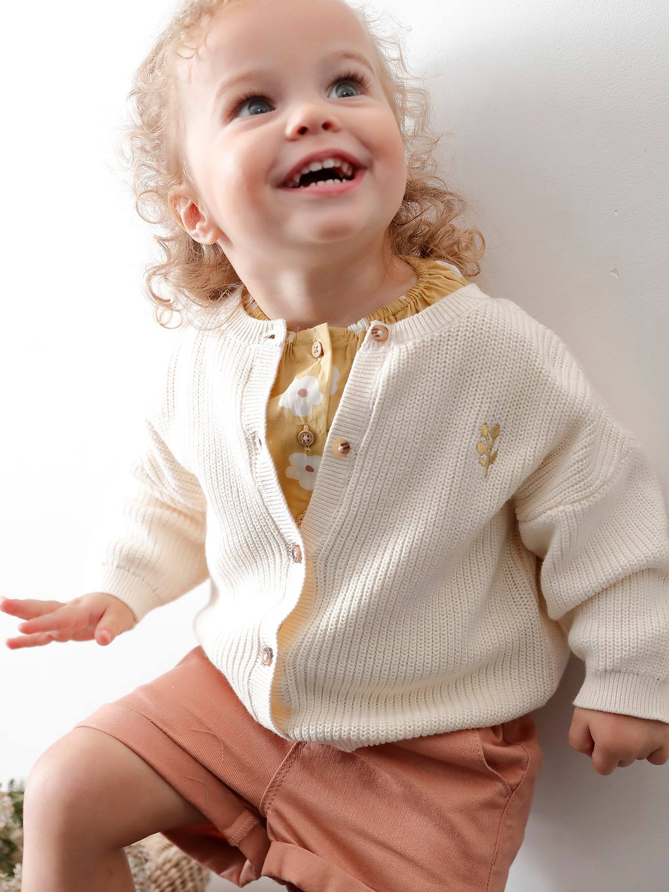 Gilet bébé en côtes anglaises motif irisé bleu ciel