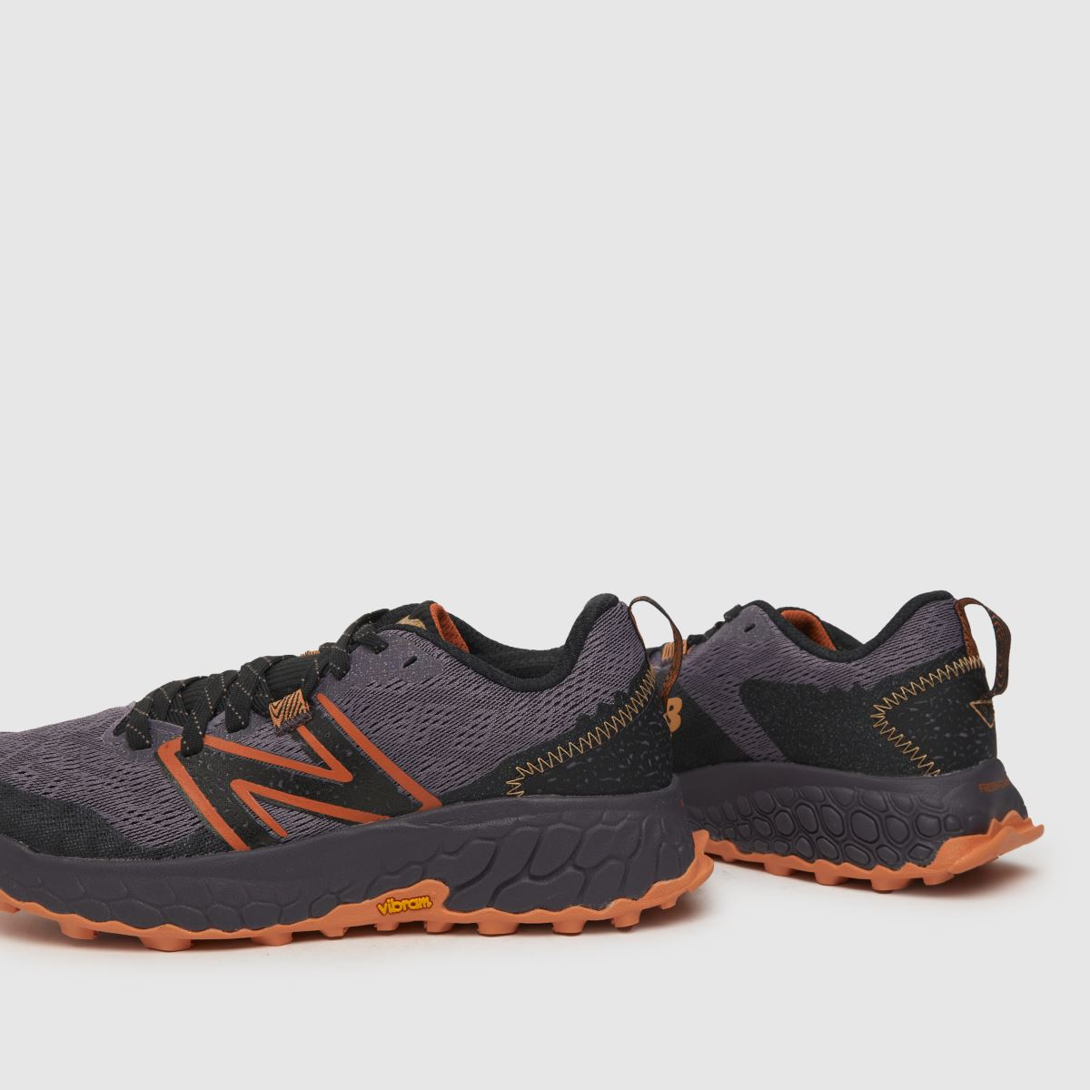 New Balance – Fresh Foam x Hierro V7 – Svarta och orangea träningsskor
