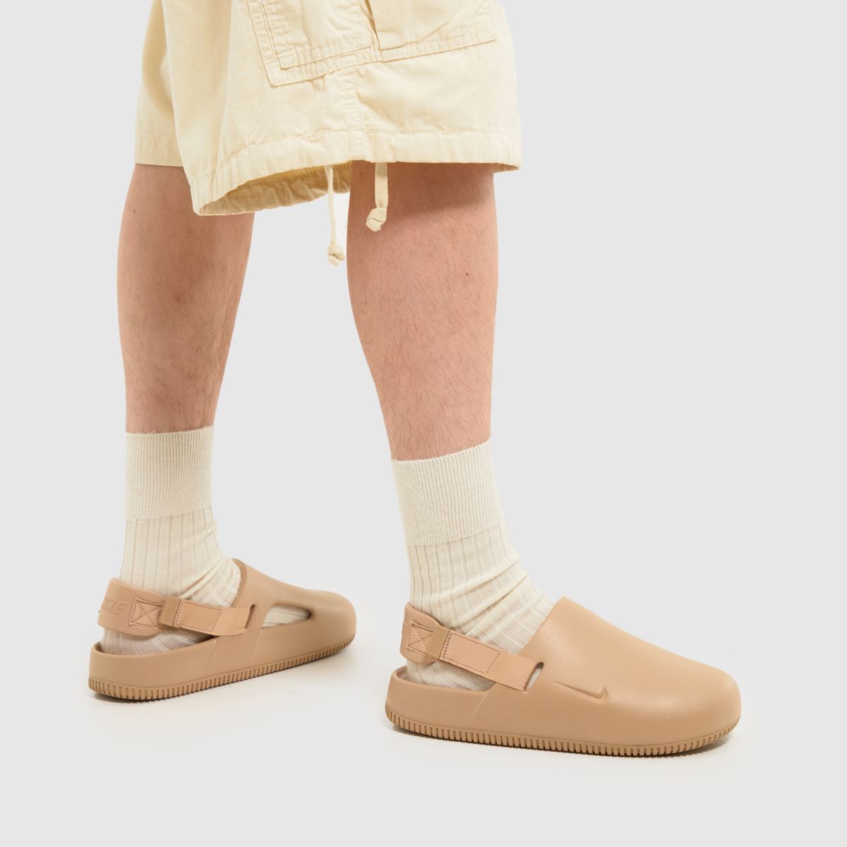 Nike – Calm Mule-sandaler i brunt