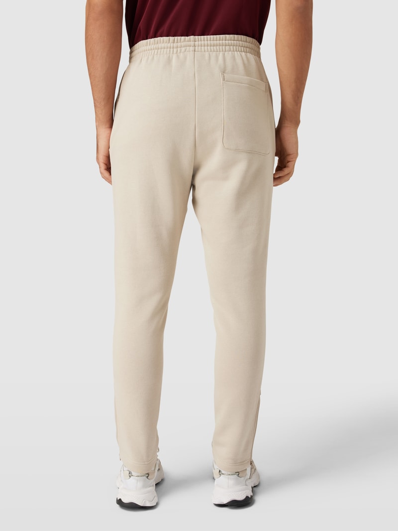 Sweatpants mit Label-Stitching in beige