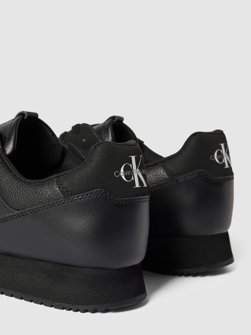 Sneaker mit Logo-Print Modell 'RETRO RUNNER' in schwarz