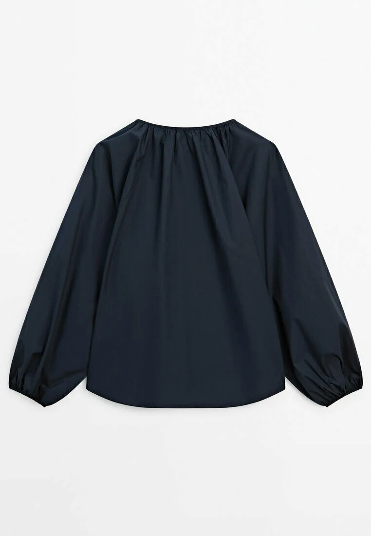 Blusa de popelina con mangas abullonadas de Massimo Dutti