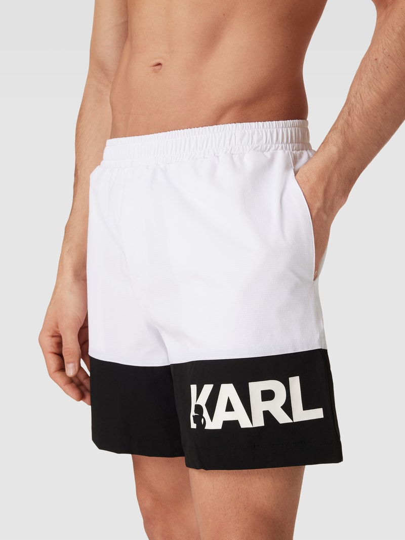 Badehose mit Eingrifftaschen in weiß