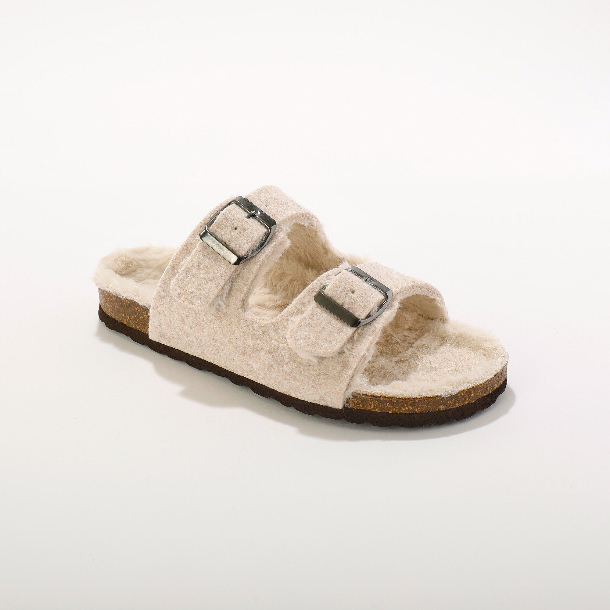 Mules fourrées à boucles