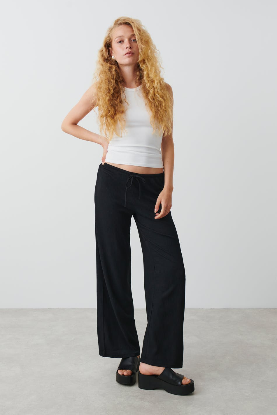 Wide low waist trousers