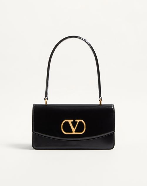 Bolsa Valentino Garavani Vain em couro de bezerro brilhante com alça.