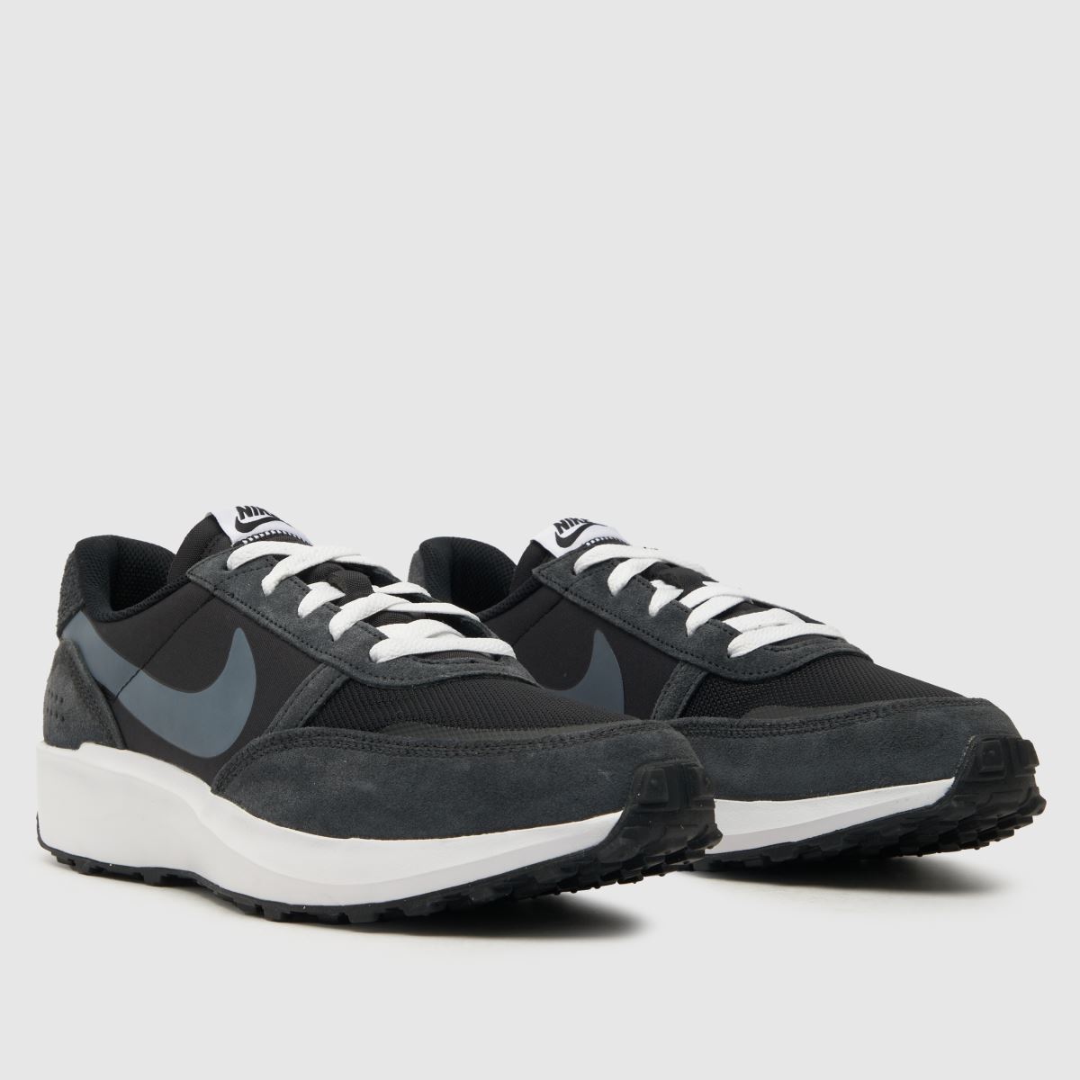 Nike – Svarta och vita våffeldebutsneakers