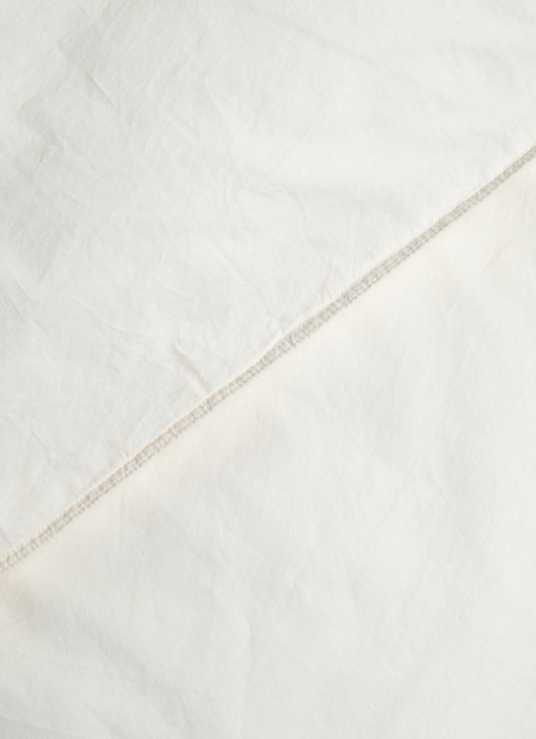 Komplet pościeli Vandyck z bawełny washed cotton: zawiera poszwę na kołdrę i poszewkę na poduszkę.