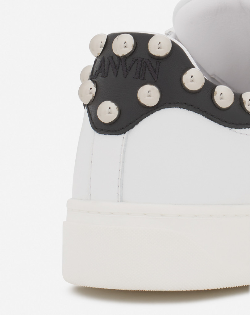 SNEAKERS DDB0 EN CUIR AVEC STUDS