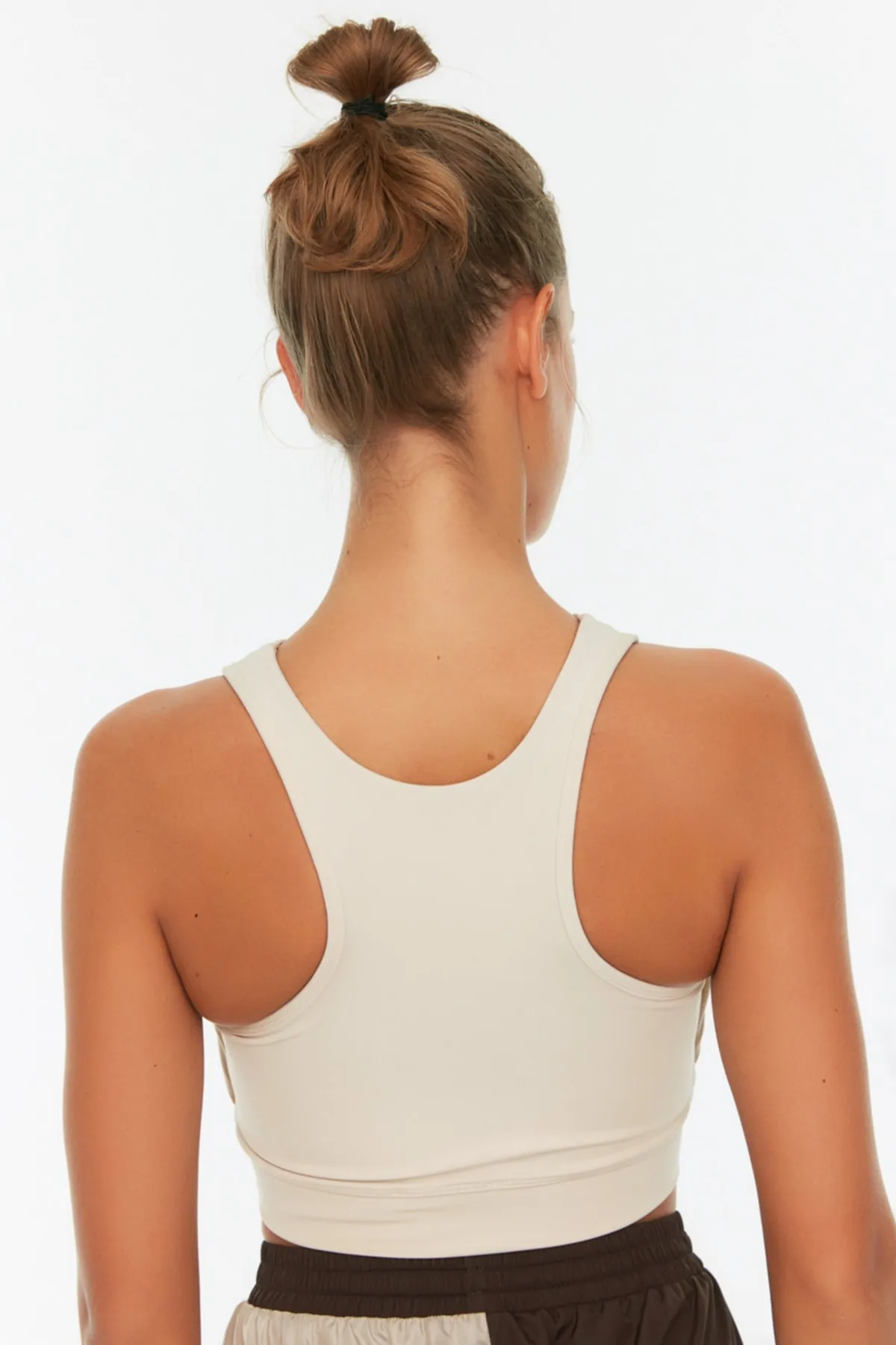 Trendyol Collection  Beigefarbener gestrickter Sport-BH mit stützendem/formendem Neckholder TWOSS22SS0042