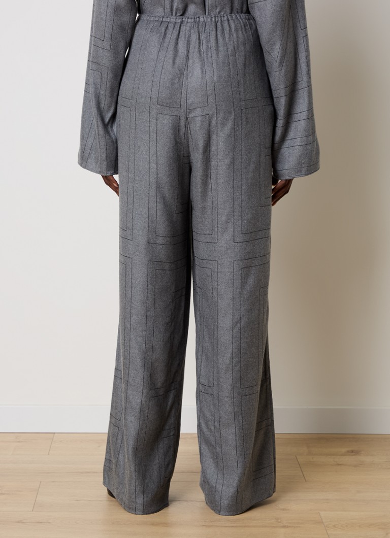 Pantaloni TOTEM a vita alta e gamba larga con logo ricamato.
