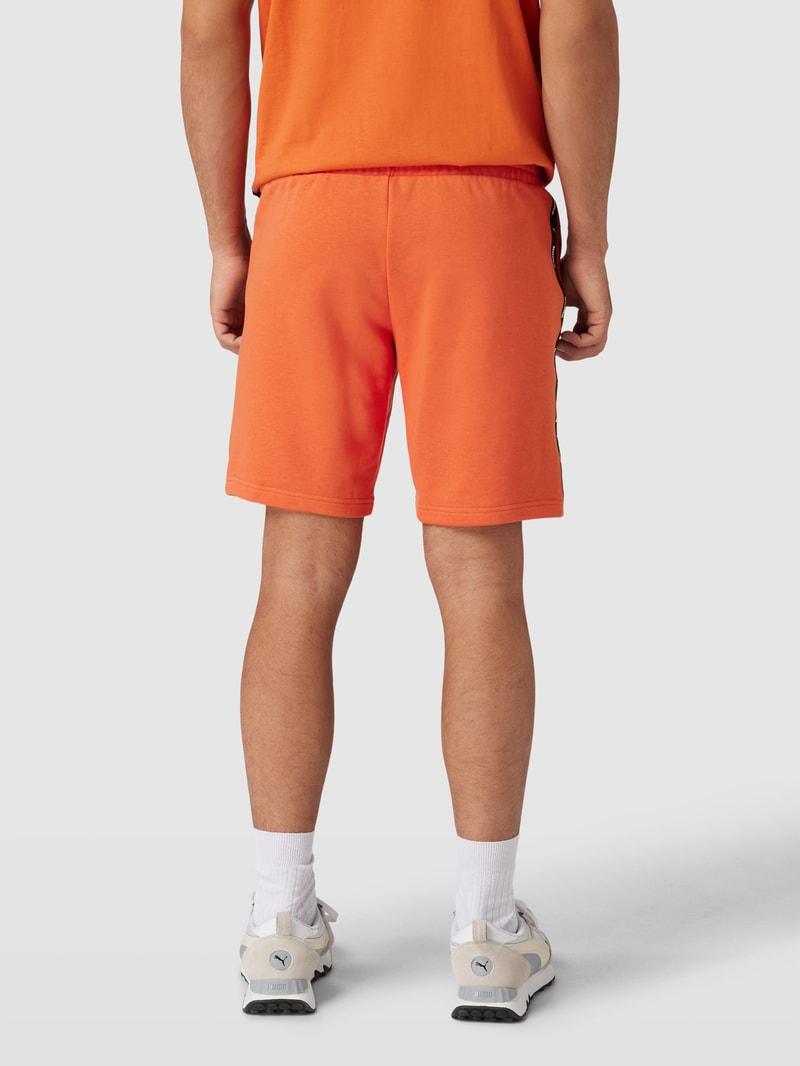 Sweatshorts mit Label-Print in hellrot
