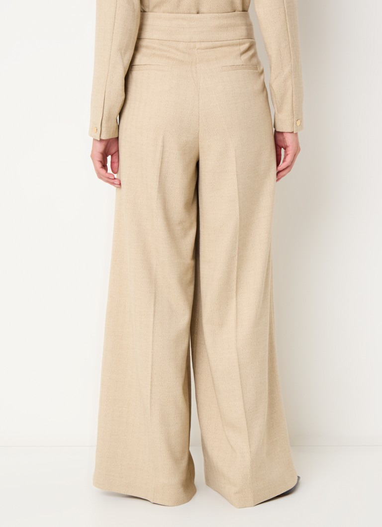 Pantaloni cu talie înaltă, cu croială largă și cute călcate, de la Aaiko Nore.