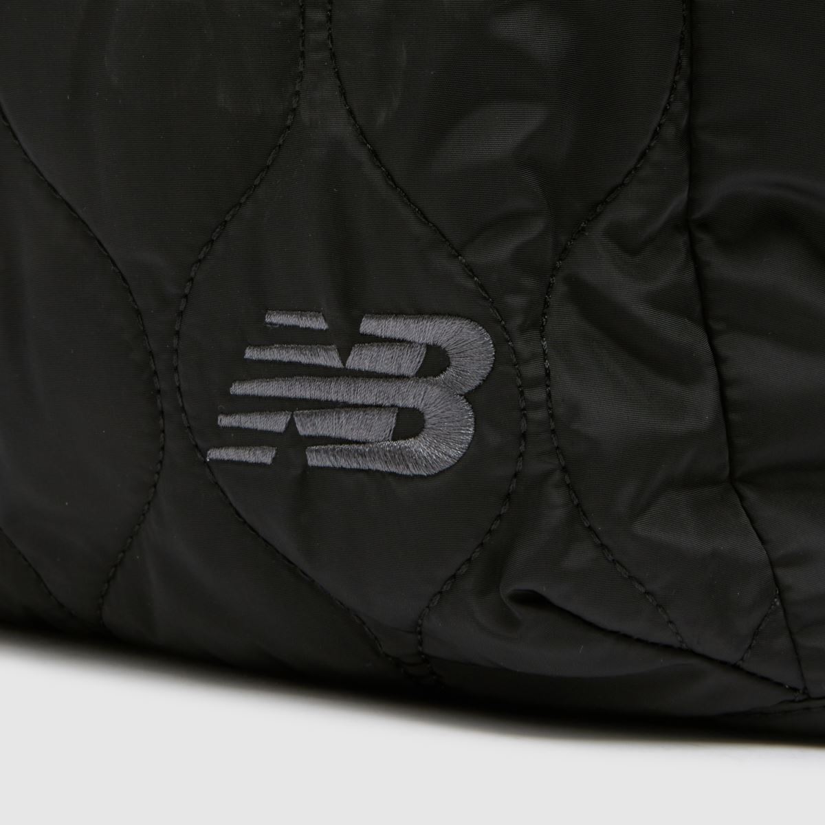 New Balance svart quiltad ryggsäck