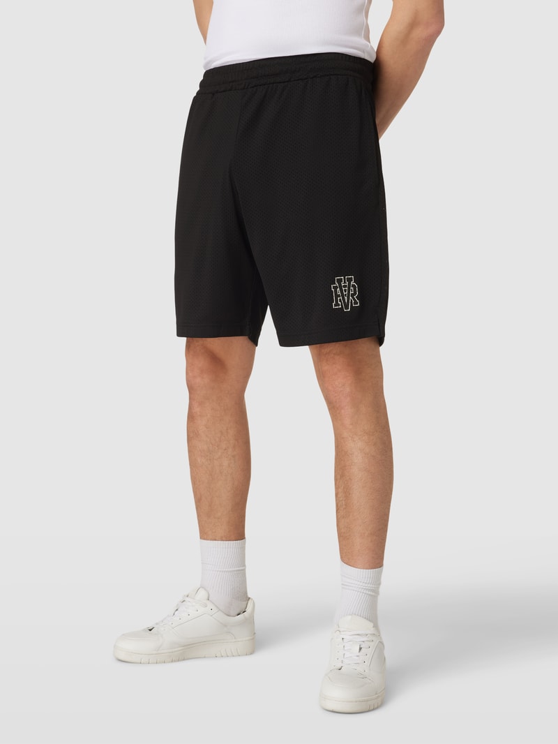 Shorts mit Camouflage-Muster in schwarz