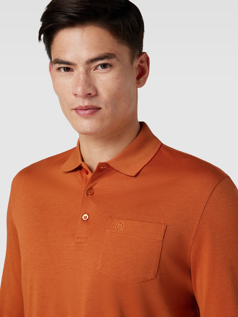 Poloshirt mit Brusttasche in rostrot
