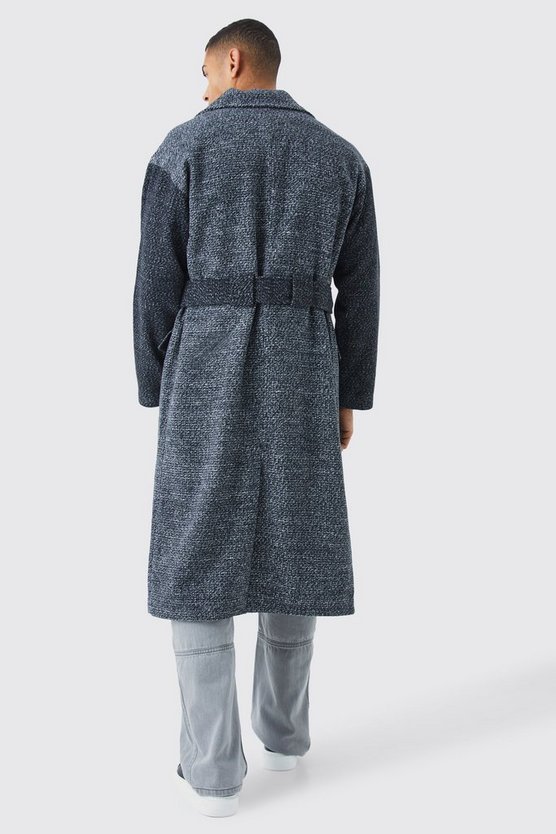 Schwarz-weißer Mantel mit Kontrast-Ärmeln und Gürtel