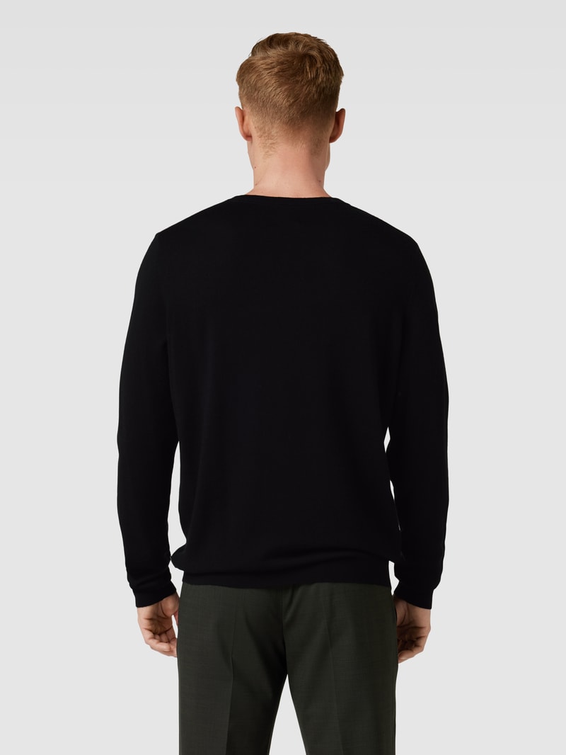 Strickpullover aus Wolle mit Rundhalsausschnitt in schwarz