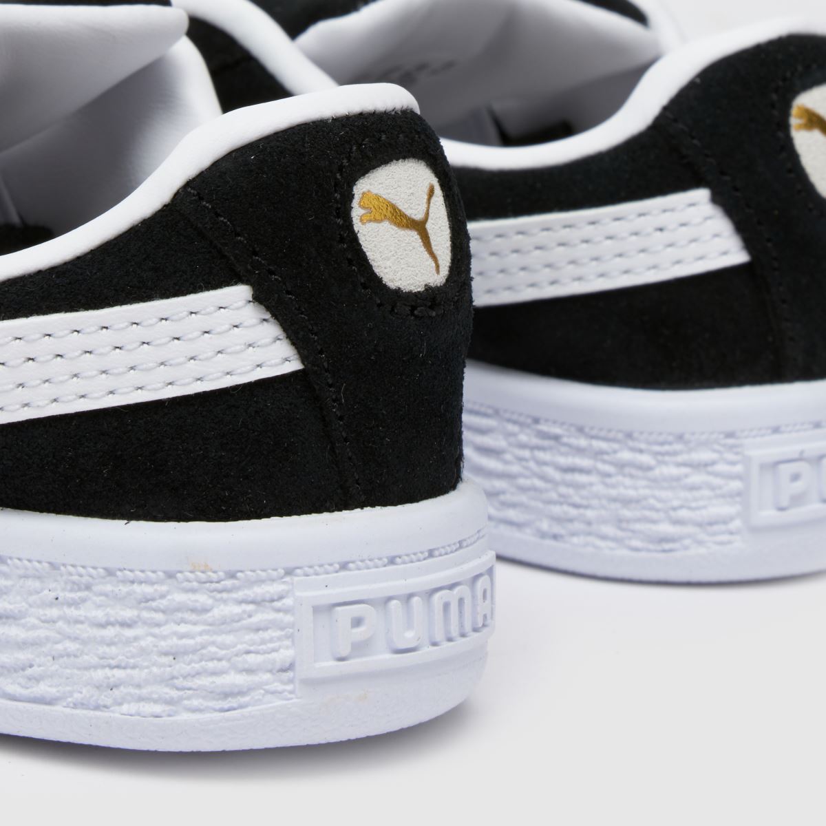 PUMA svarta och vita mocka XL småbarnssneakers