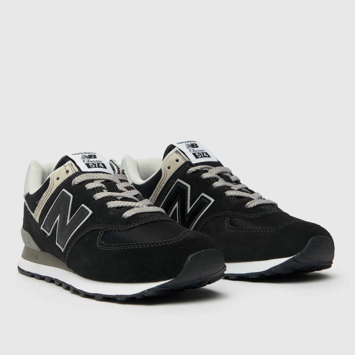 New Balance 574 cipők fekete és fehér színben
